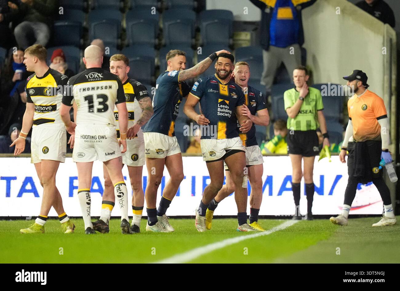 Leeds Rhinos' Kallum Watkins (centre) celebrates scoring a try during ...