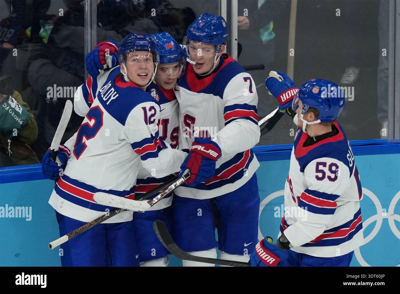 United States' Jack Hughes (86) celebrates with Matt Boldy (12), Brady ...