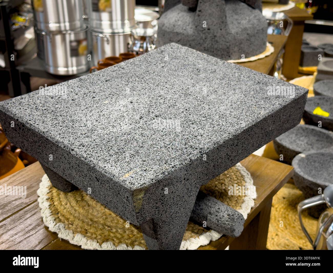 A view of a metate, on display at a local grocery store Stock Photo - Alamy