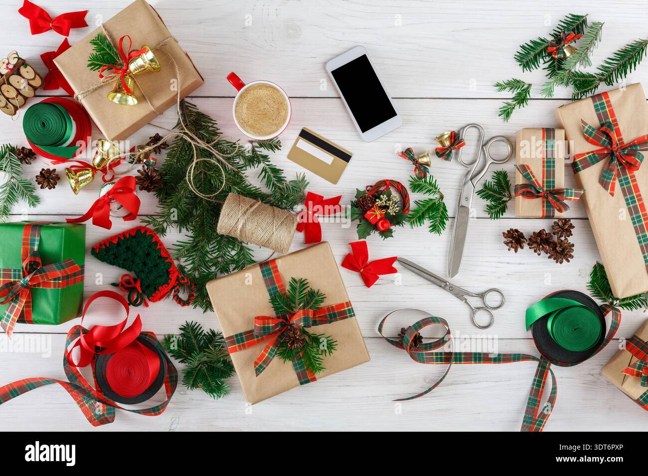 Creative Gift Wrapping Ideas for Holidays With Items and Tools on a Table Stock Photo
