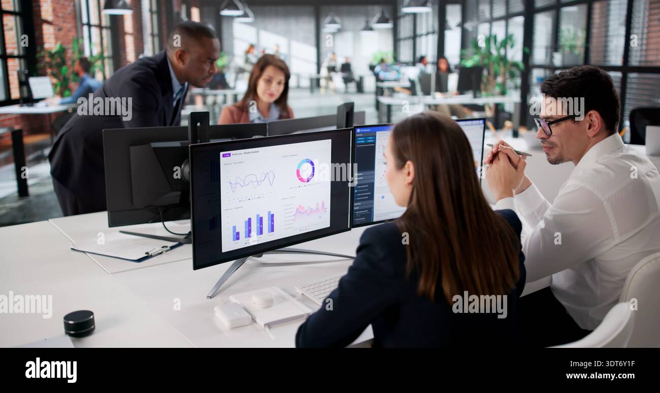 Analytical Team Led By Diverse Manager Analyzing Financial Data Dashboard. Stock Photo