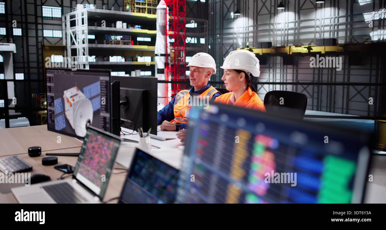 Engineer Uses SCADA Software To Control Rocket Construction In Lab. Stock Photo