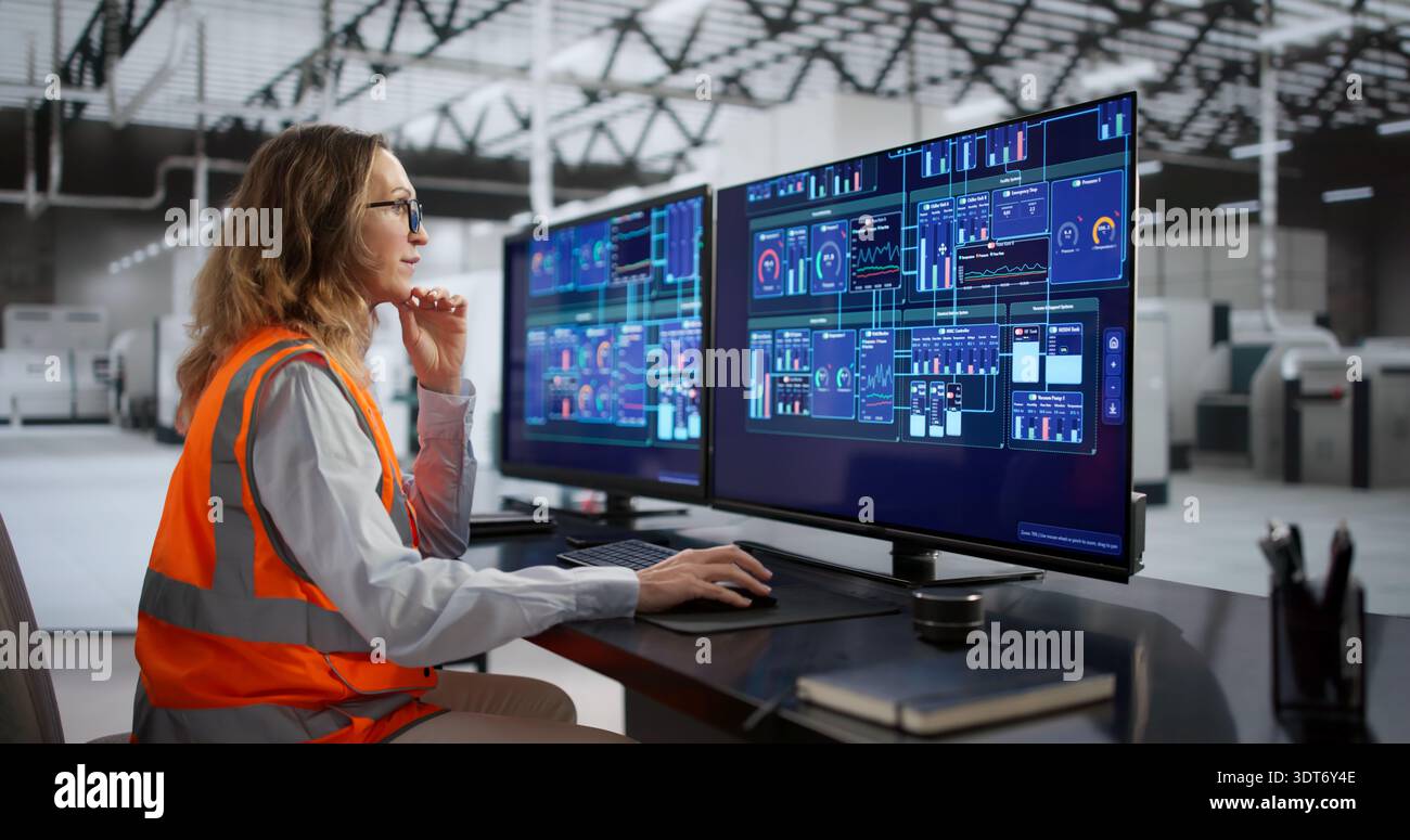 Factory Scada Female SCADA Operator Efficiently Controls Modern Factory Technology ...