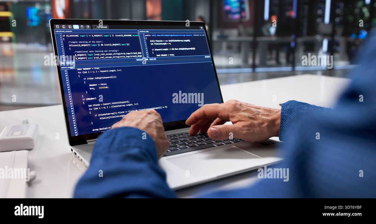 Male Programmer Codes Secure Software For Online Data Protection Project Stock Photo