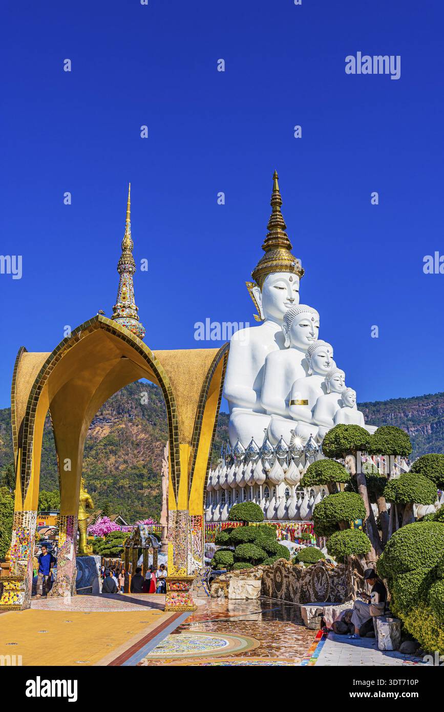 Round arch pavilion, the five-headed Buddha statue at the back, Wat Phra That Sorn Kaew Buddhist temple complex, Phetchabun province, Thailand Stock Photo