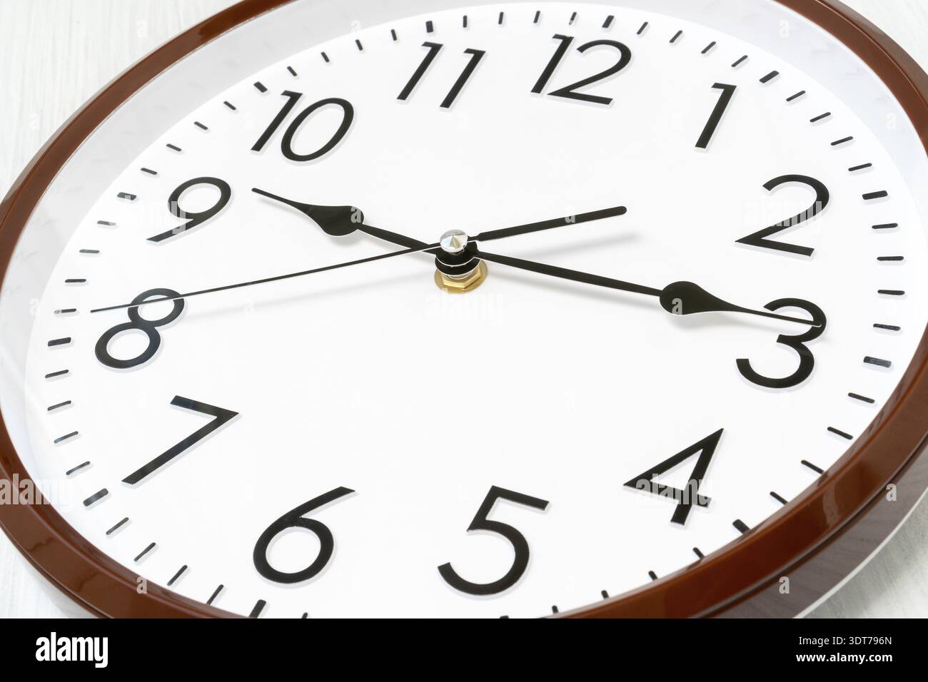 Dial wall clock in a classic style, close-up view Stock Photo