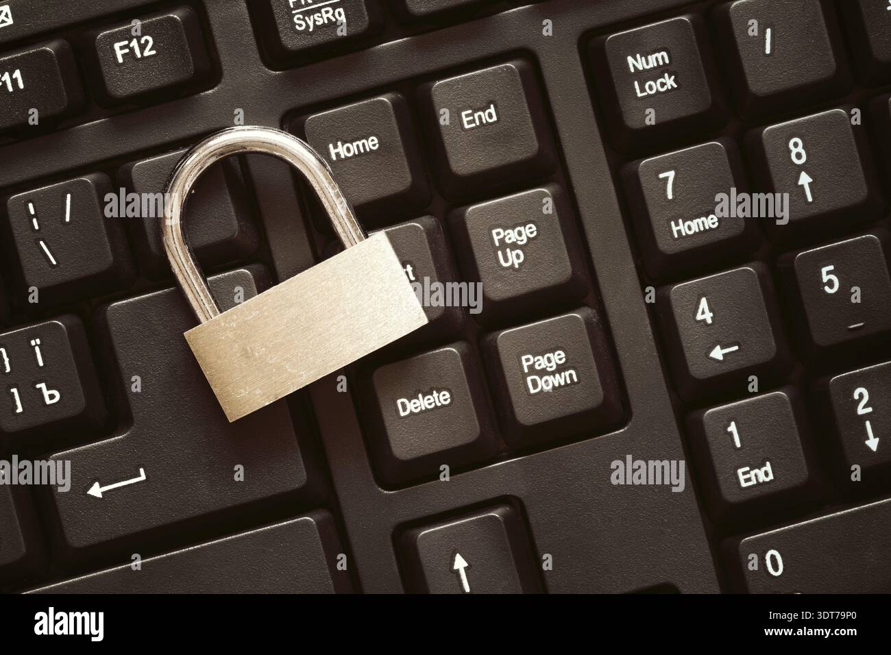 Security lock on black computer keyboard - computer security concept Stock Photo