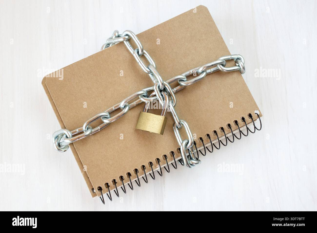 Censorship concept, notepad with chain and padlock Stock Photo