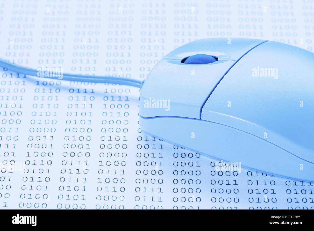 Computer mouse on binary code background. Blue tone image Stock Photo