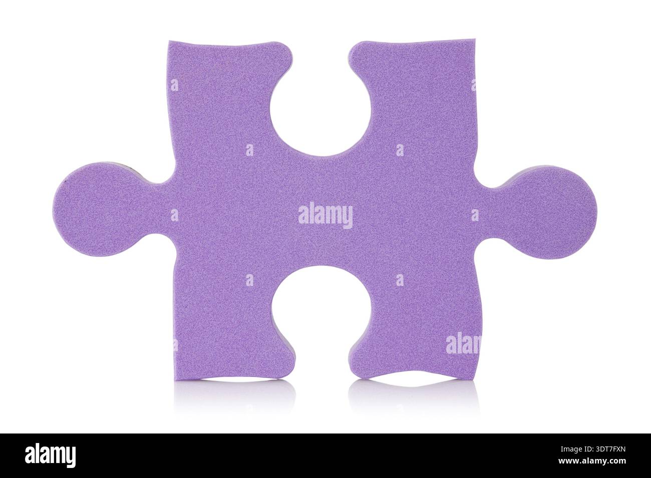 Purple puzzle piece over a white background Stock Photo