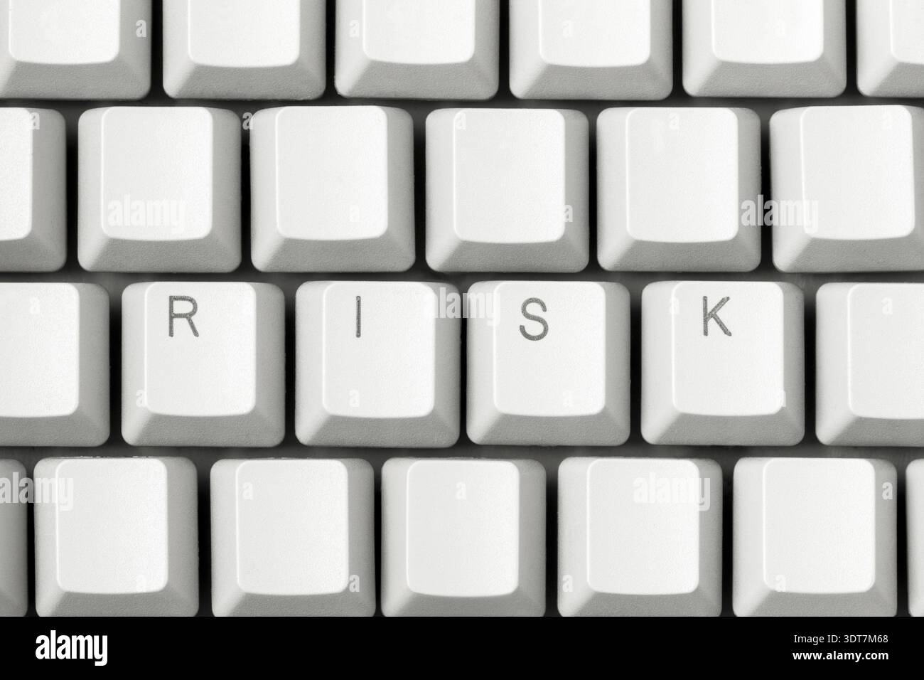 Risk lettering on white key on computer keyboard. Risk concept idea Stock Photo