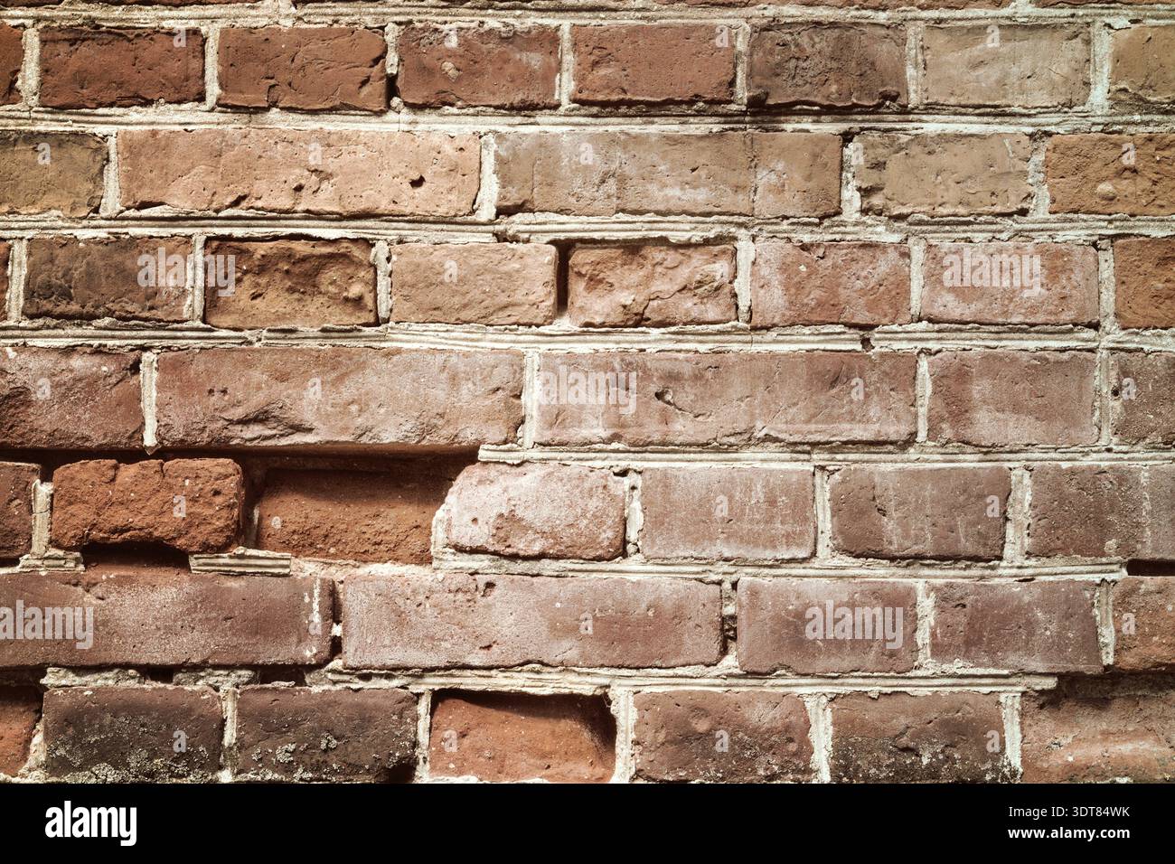 Messy red brown old shabby brick wall background texture Stock Photo