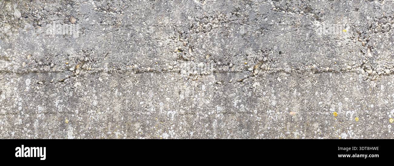 Rough concrete surface showing texture and subtle color variations Stock Photo