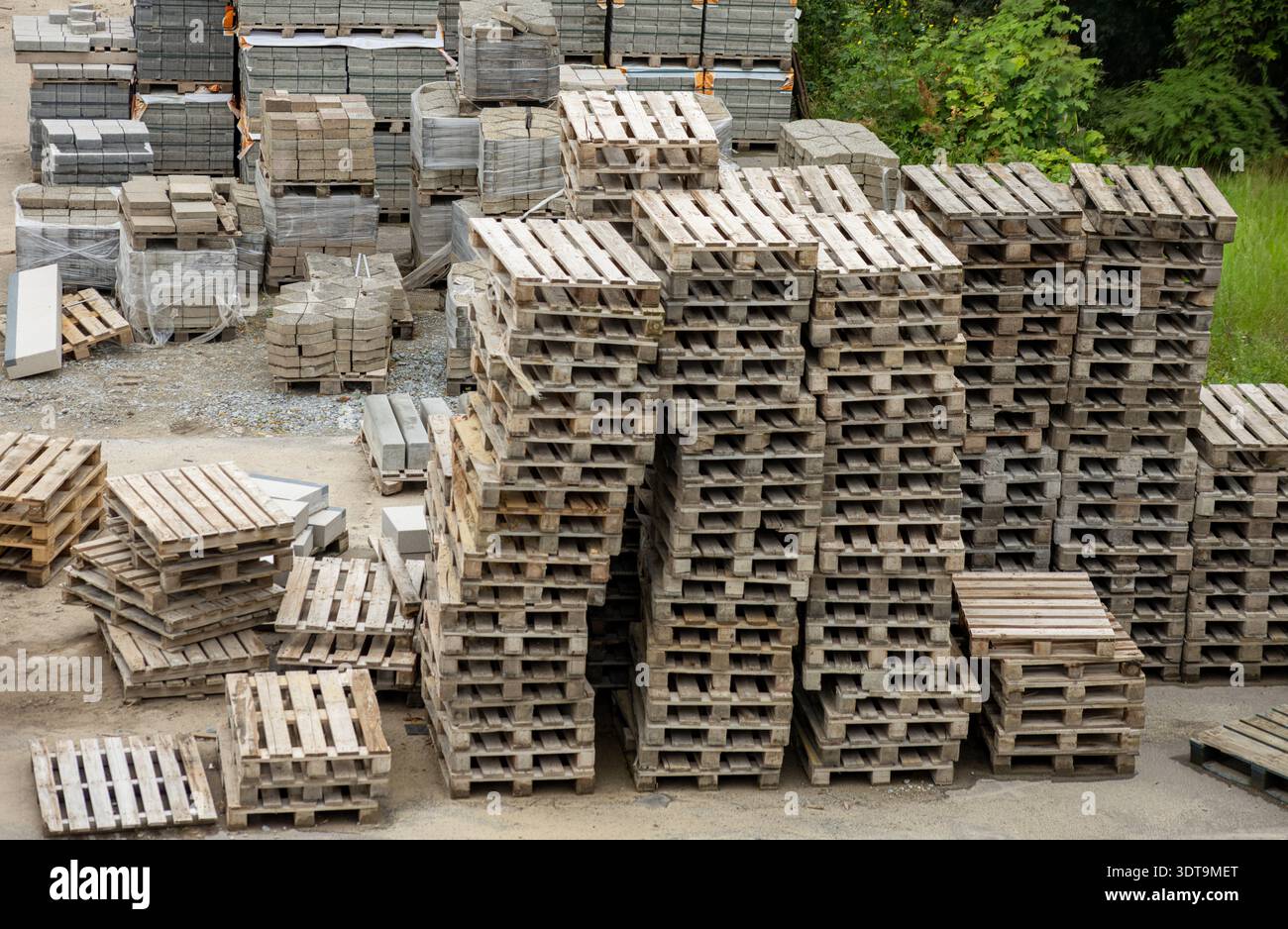 Woking Pallets Collection Stacked Wooden Pallet Collection In Industrial Warehouse Outdoor ...
