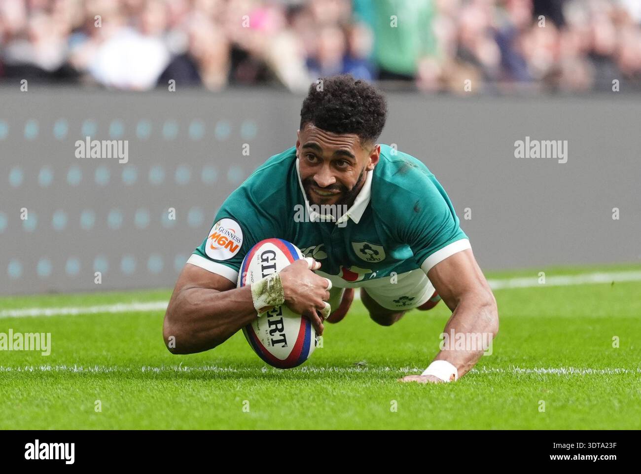 Ireland's Robert Baloucoune scores their second try during the Guinness ...