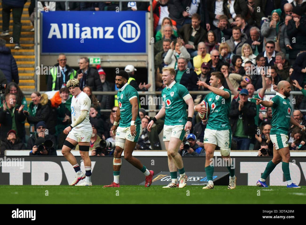 Ireland's Rob Baloucoune, second from left, celebrates with teammates ...