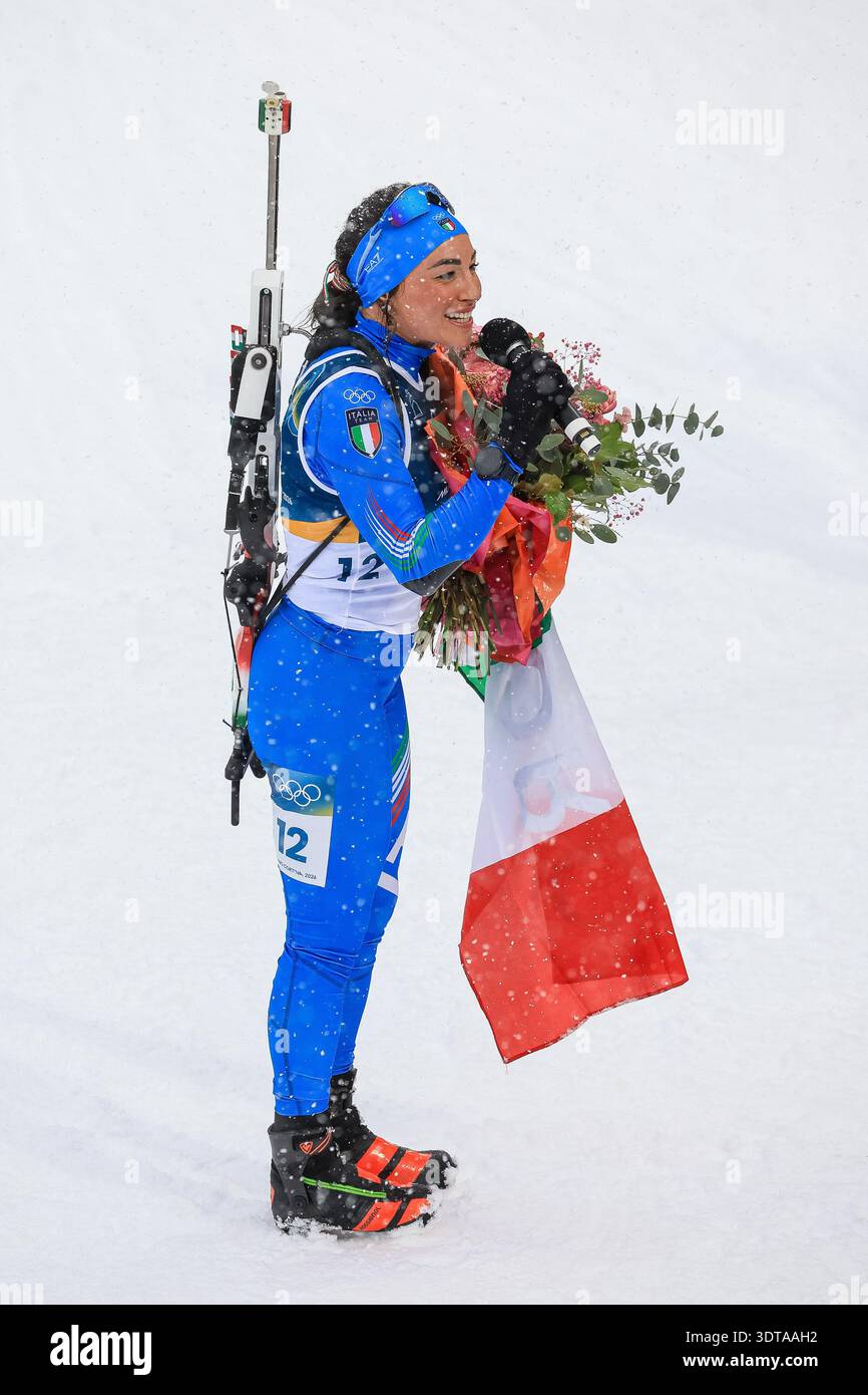Dorothea Wierer (ITA) celebrates the last race of her career at the end