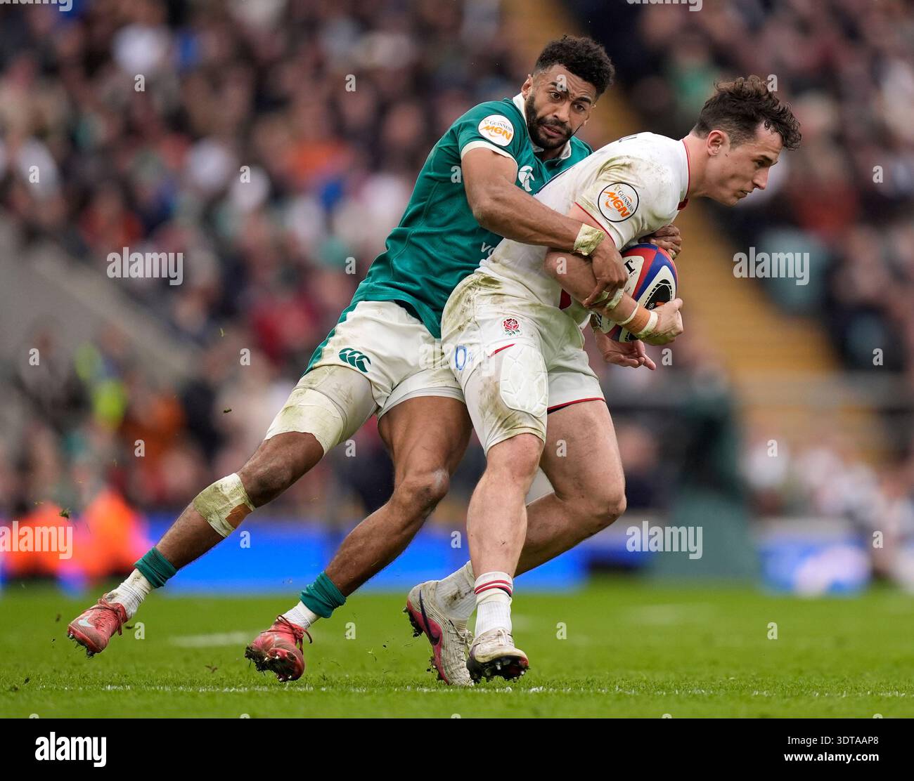 Ireland's Robert Baloucoune tackles England's Henry Arundell during the ...