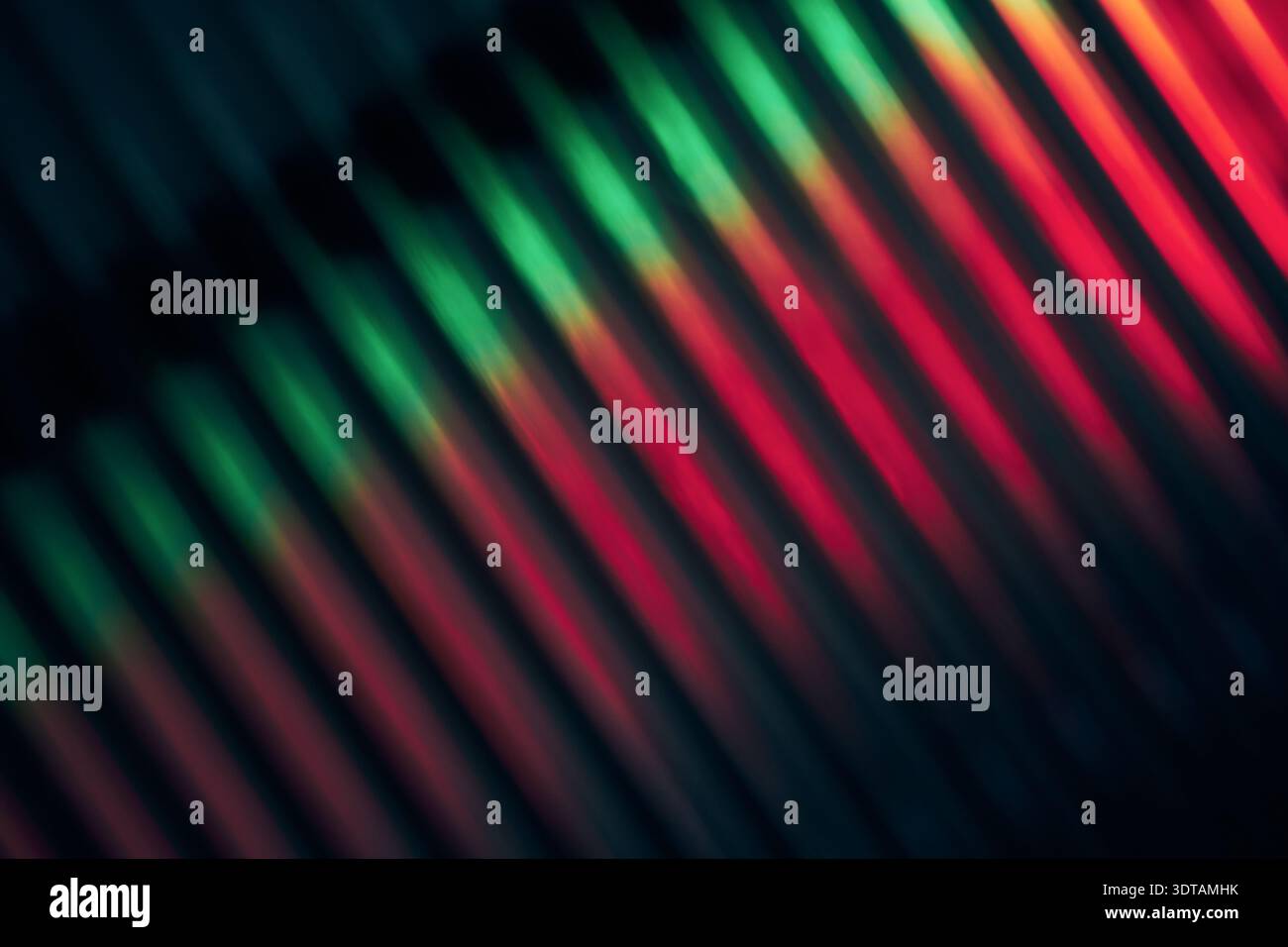 Diagonal light lines forming an abstract pattern on Blurred ribbed glass Stock Photo