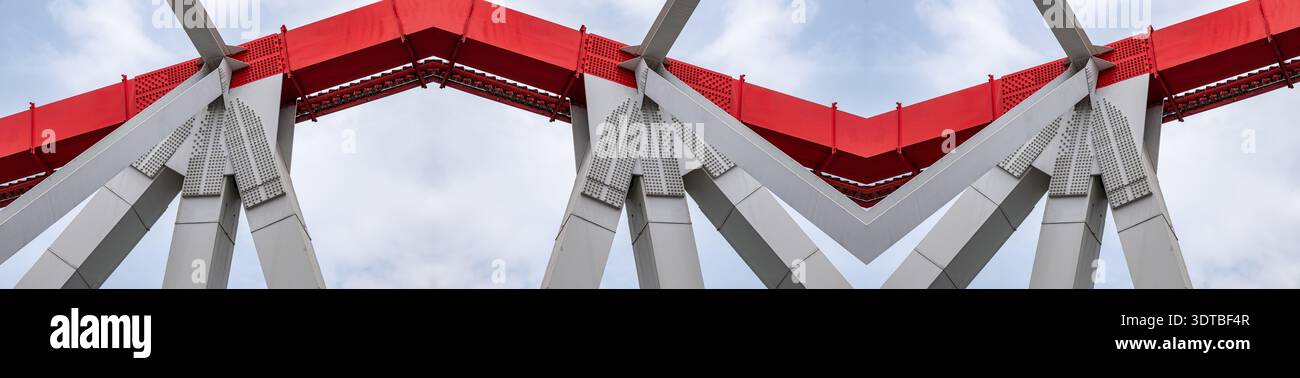 steel beams is bolted down. Close-up shows the connection of the metal ...