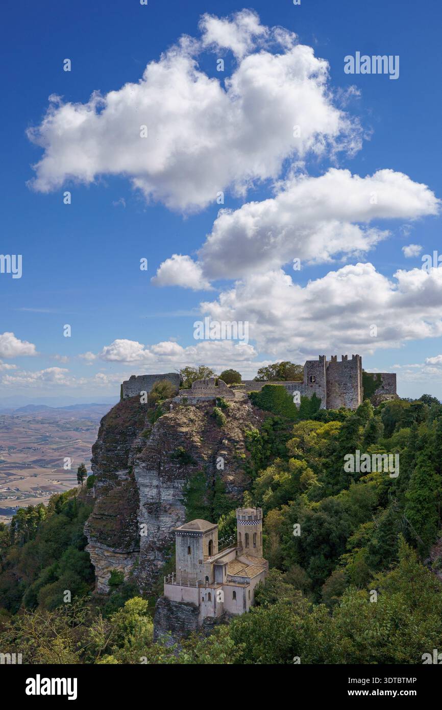 the historical fortifications of Erice, showcasing the juxtaposition of the original Torri del Balio (Norman military towers) and the 19th-century rom Stock Photo