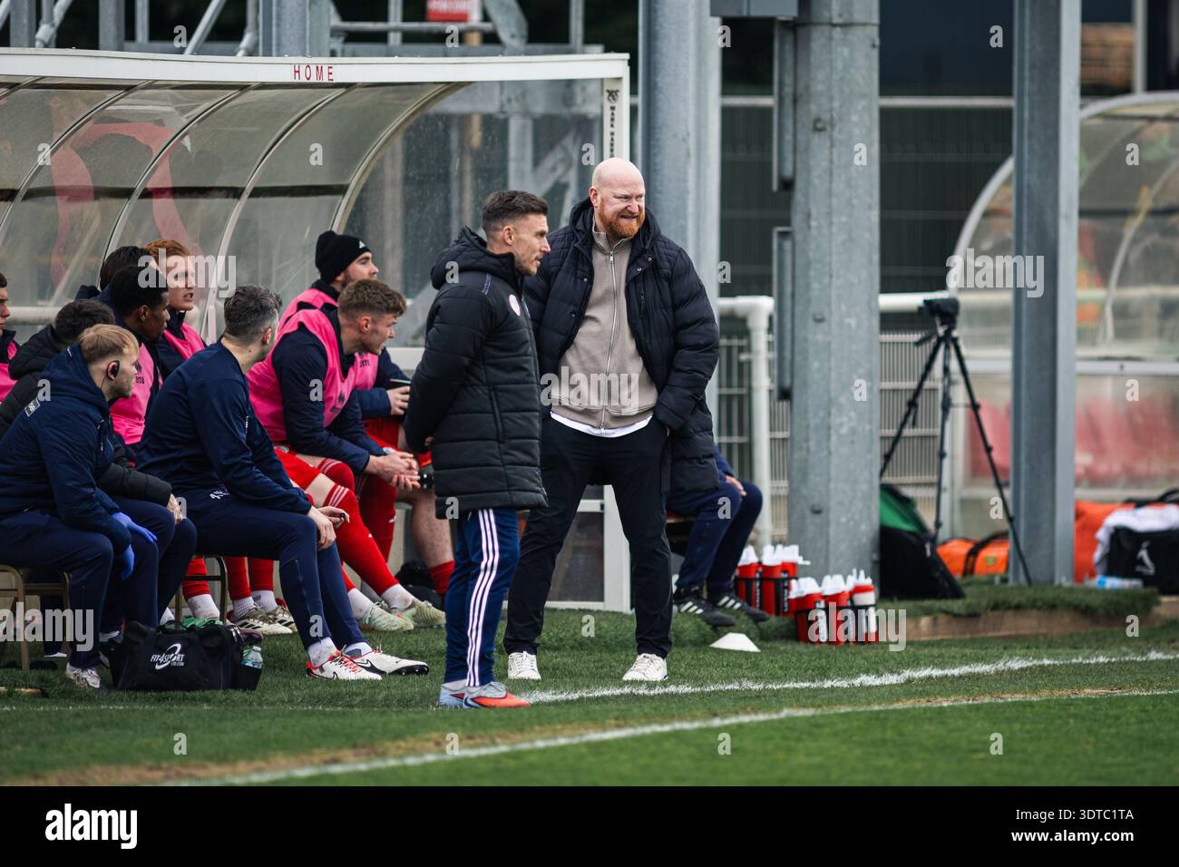 Brackley, UK. 21st Feb, 2026. Andy Whing (Brackley Town Manager) looks ...