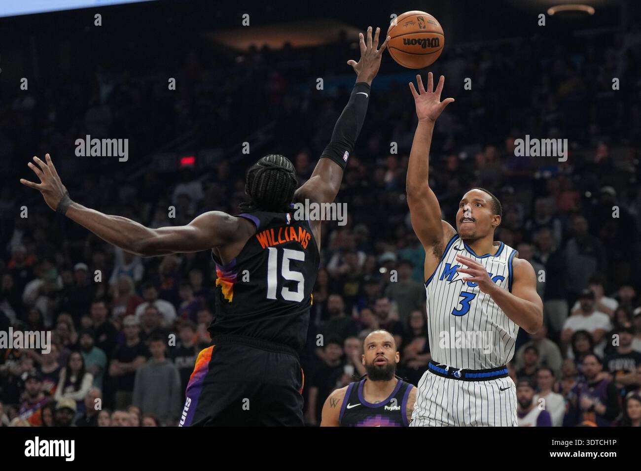 Orlando Magic guard Desmond Bane (3) shoots over Phoenix Suns center ...