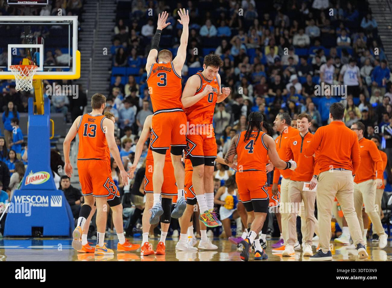 Illinois forward Ben Humrichous (3) celebrates his three-point basket ...