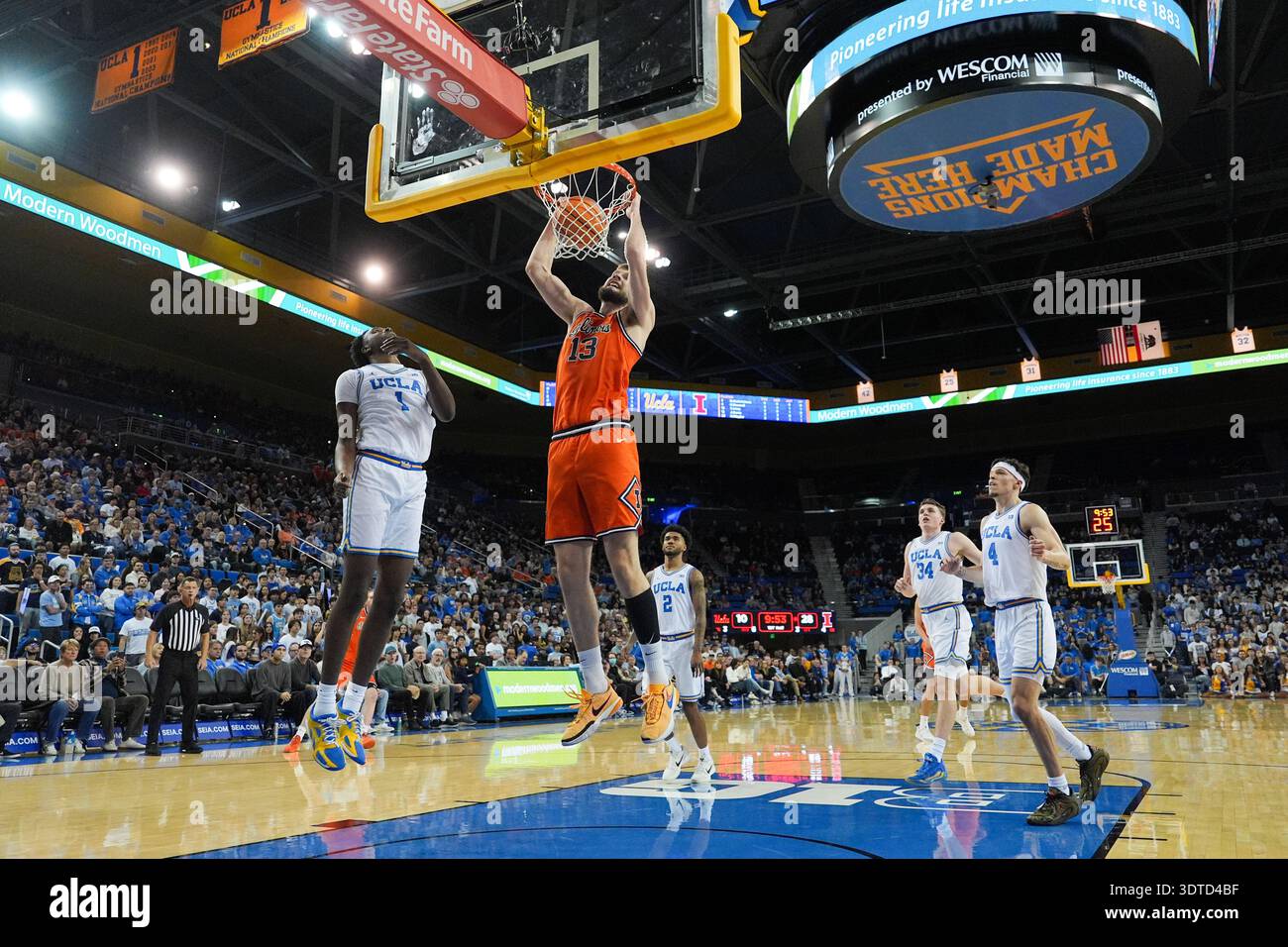 Illinois center Tomislav Ivisic (13) dunks during the first half of an ...