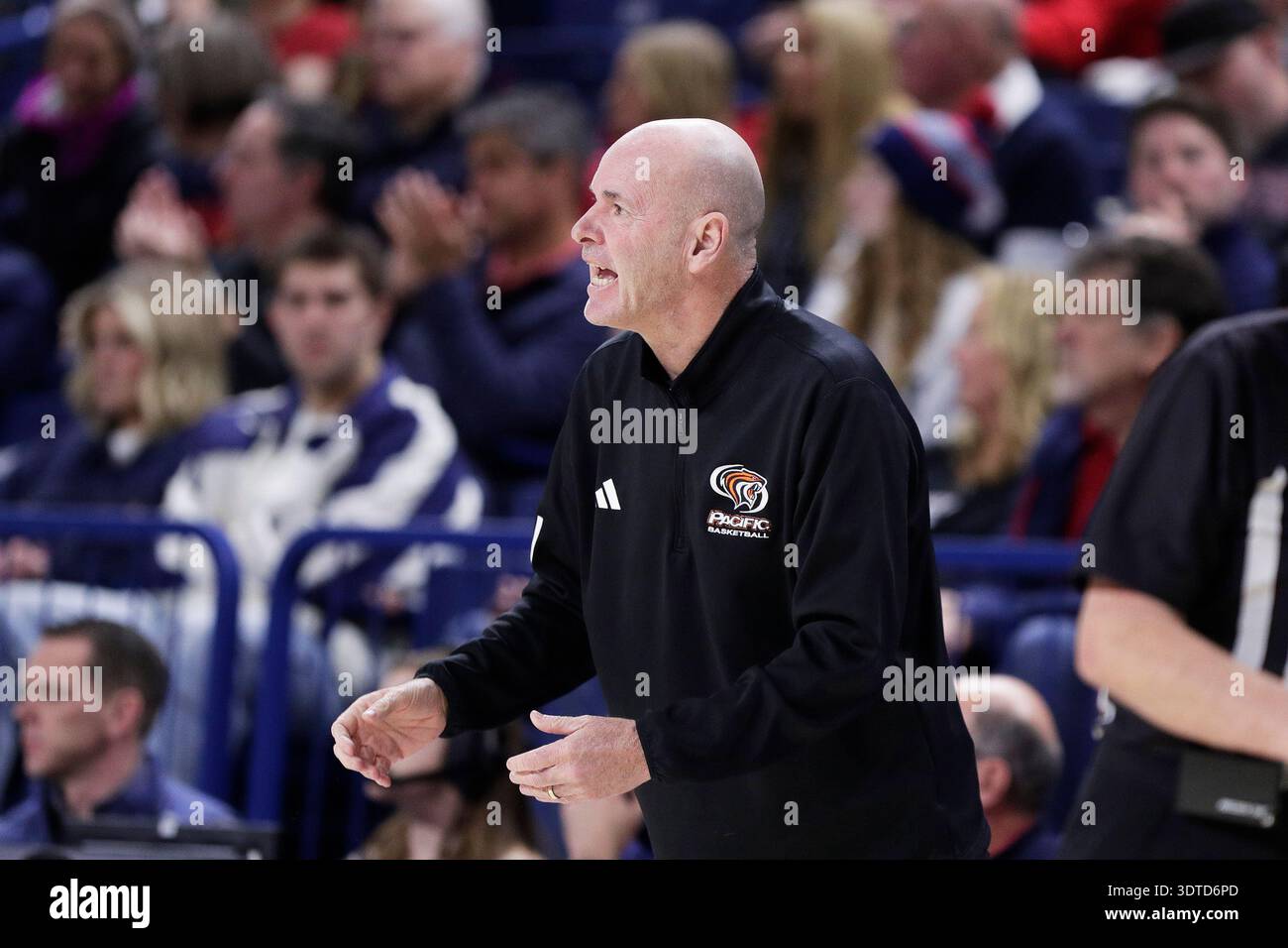 Pacific head coach Dave Smart directs his team during the first half of ...