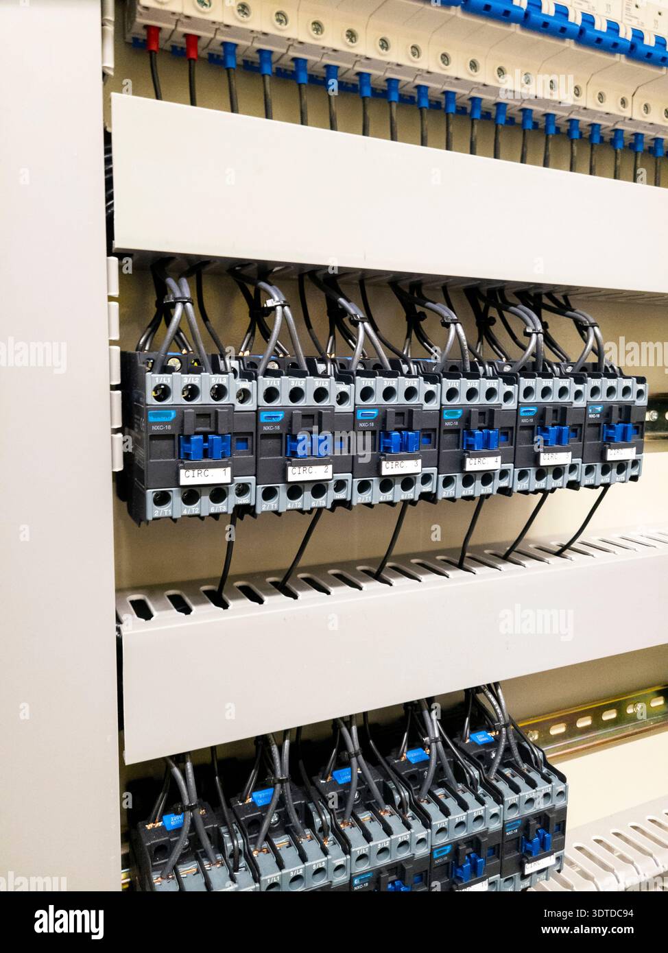 Industrial electrical control panel with wiring and circuit breakers ...
