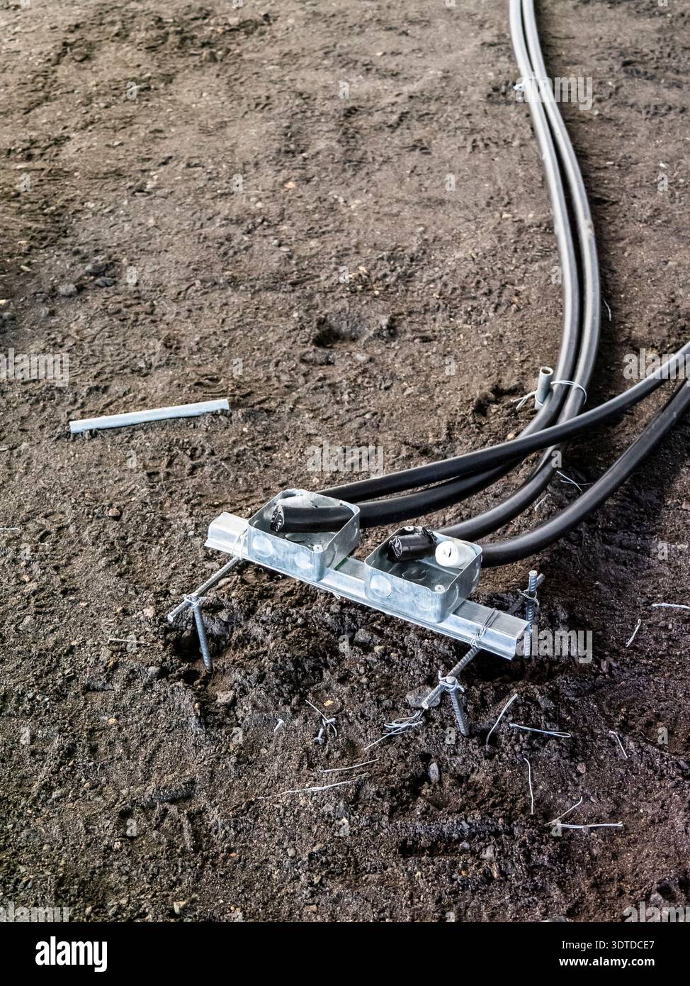 Electrical installation groundwork for industrial construction site Stock Photo