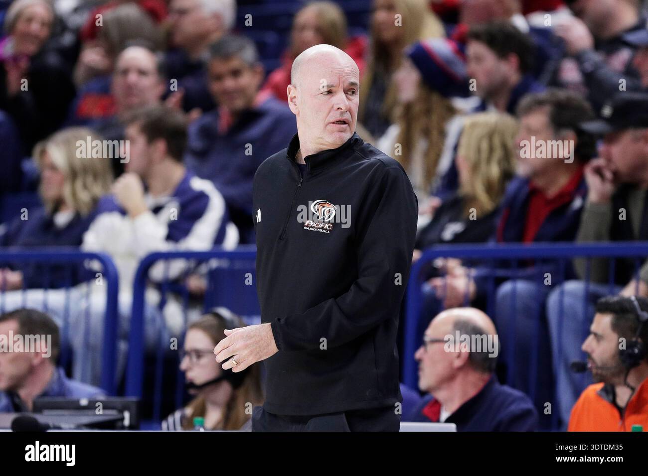 Pacific head coach Dave Smart looks towards his bench during the first ...