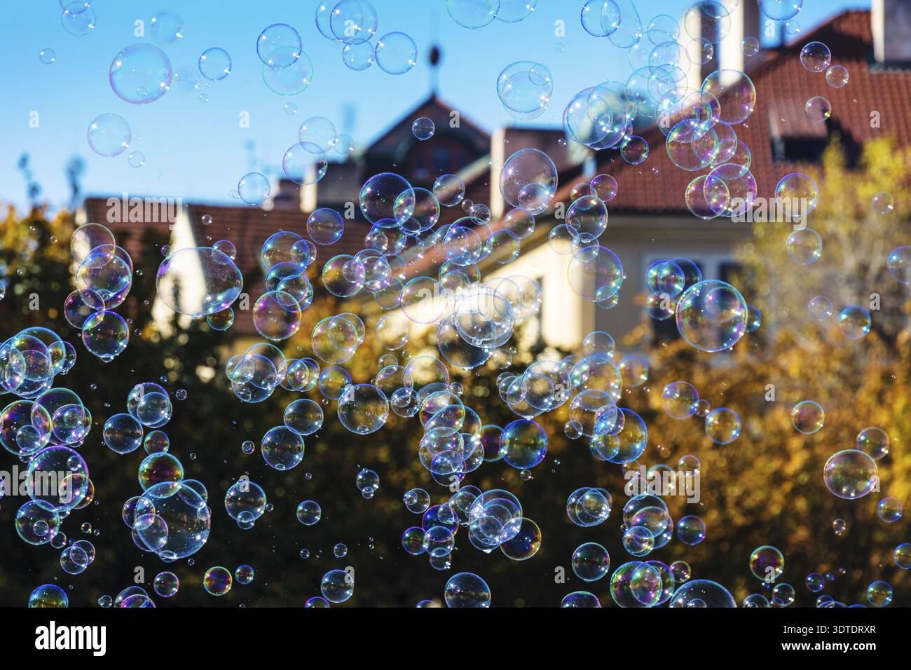 The rainbow bubbles from the bubble blower Stock Photo