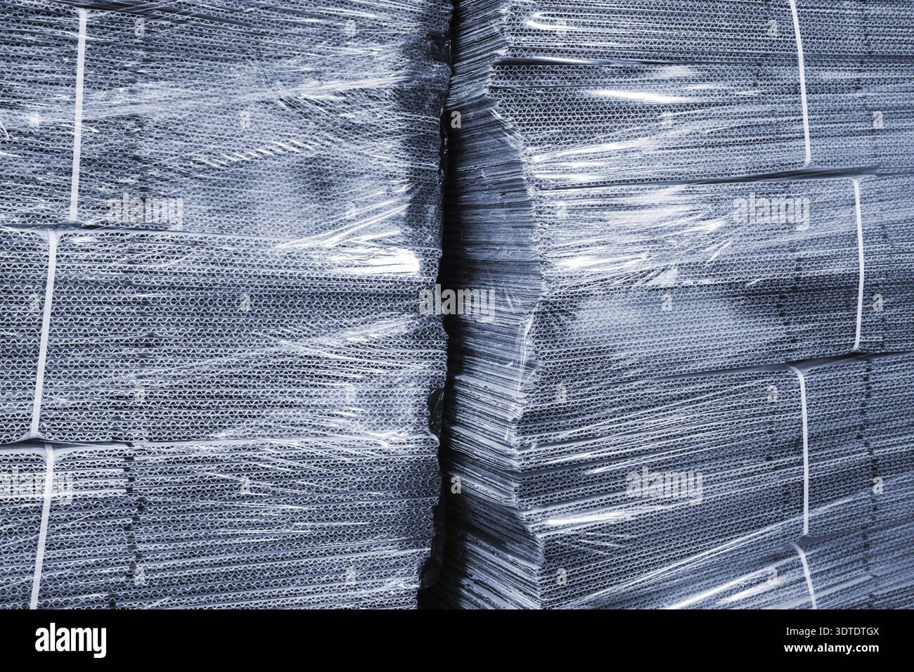 Corrugated cardboard packaging in cellophane Stock Photo