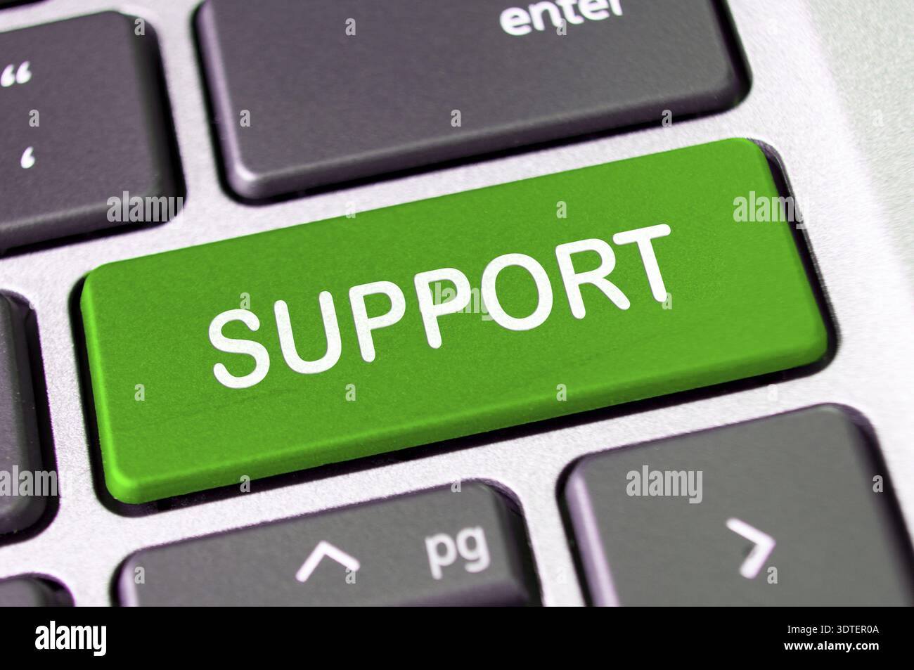 Support text on laptop keyboard button. After service support concept Stock Photo