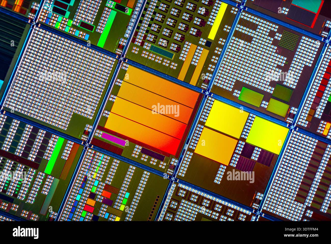 Detailed view of patterned silicon semiconductor wafer showing many ...