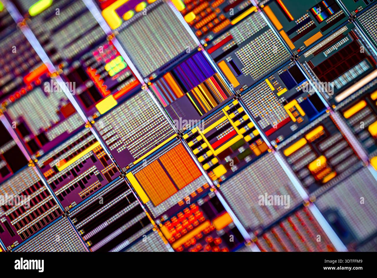 Detailed view of patterned silicon semiconductor wafer showing many ...