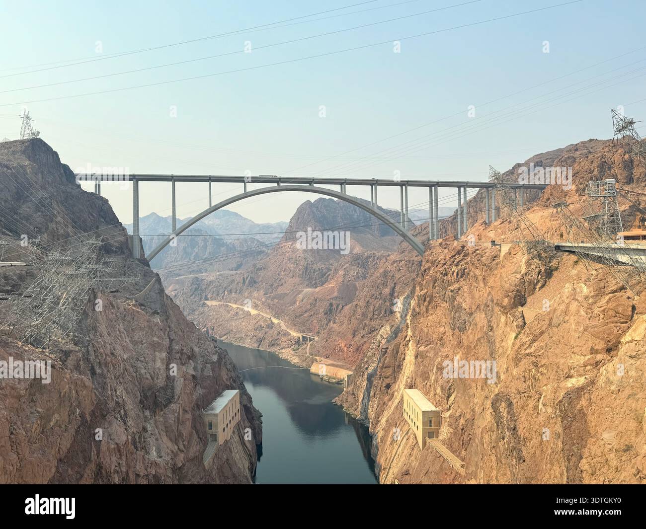 View from the top of Hoover Dam looking toward the Colorado River and Mike O'Callaghan–Pat Tillman Memorial Bridge spanning Black Canyon b - Smartphone Captured Stock Image