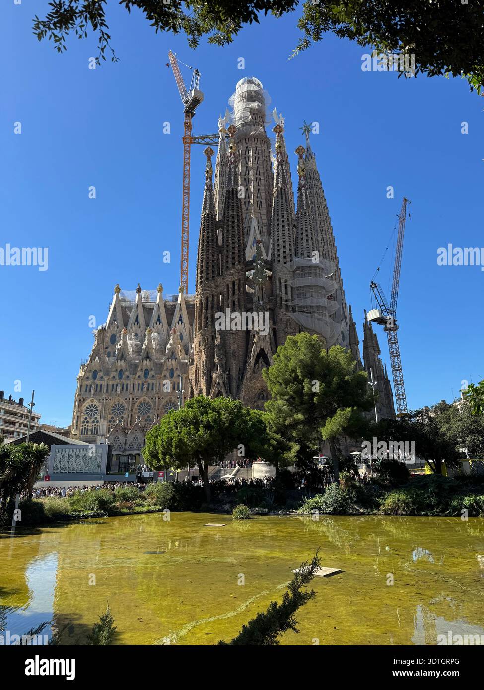 Barcelona, Spain. Basilica de la Sagrada Família designed by Antoni Gaudí still under construction against blue sky. Photo taken 24 September 2025. - Smartphone Captured Stock Image