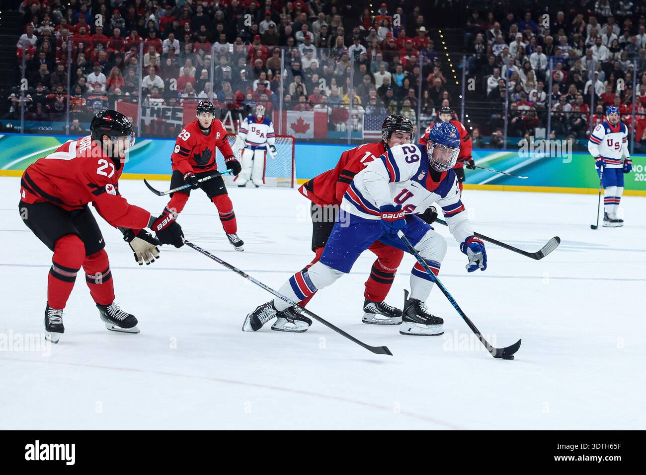 USA's Brock Nelson in action hidered by Canada's Shea Theodore during ...