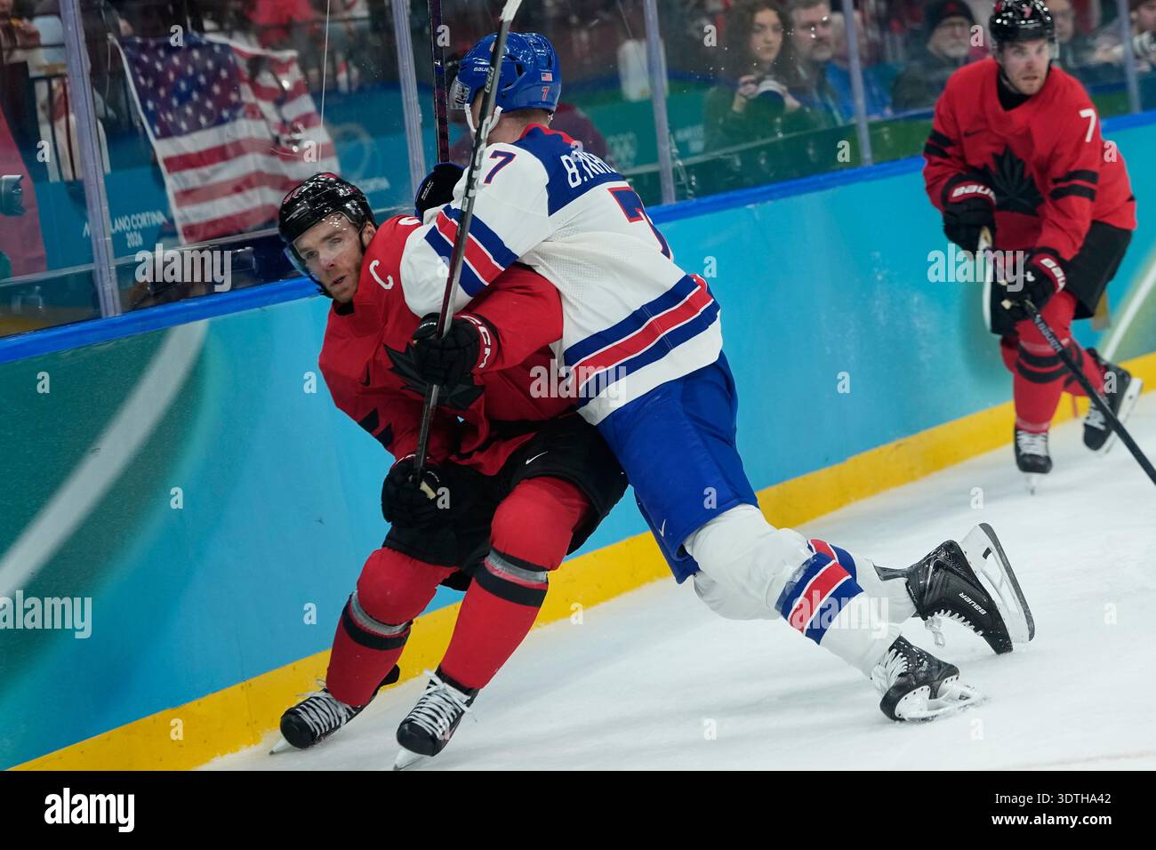 United States' Brady Tkachuk (7) checks Canada's Connor McDavid (97 ...