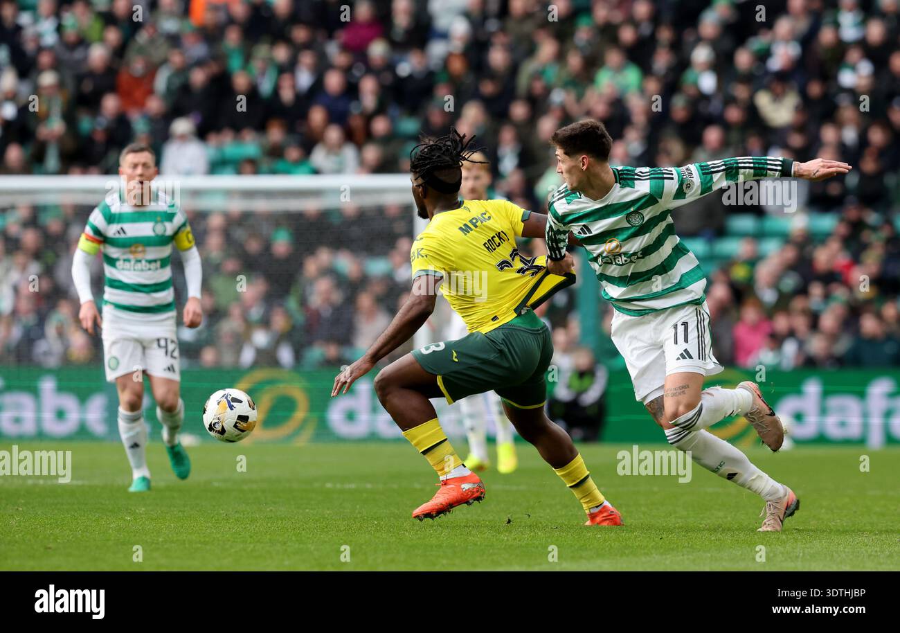 hibernian-s-rocky-bushiri-centre-and-celtic-s-tomas-cvancara-right