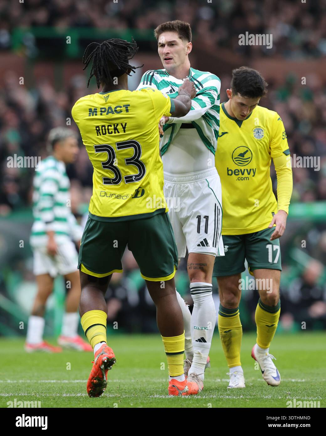 hibernian-s-rocky-bushiri-left-and-celtic-s-tomas-cvancara-grab-each