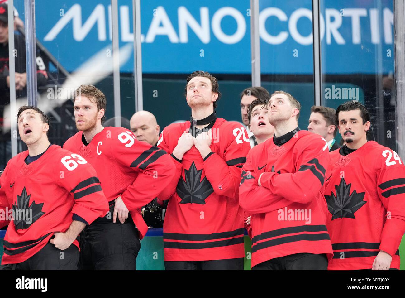 Canada players react after being defeated during a men's ice hockey ...
