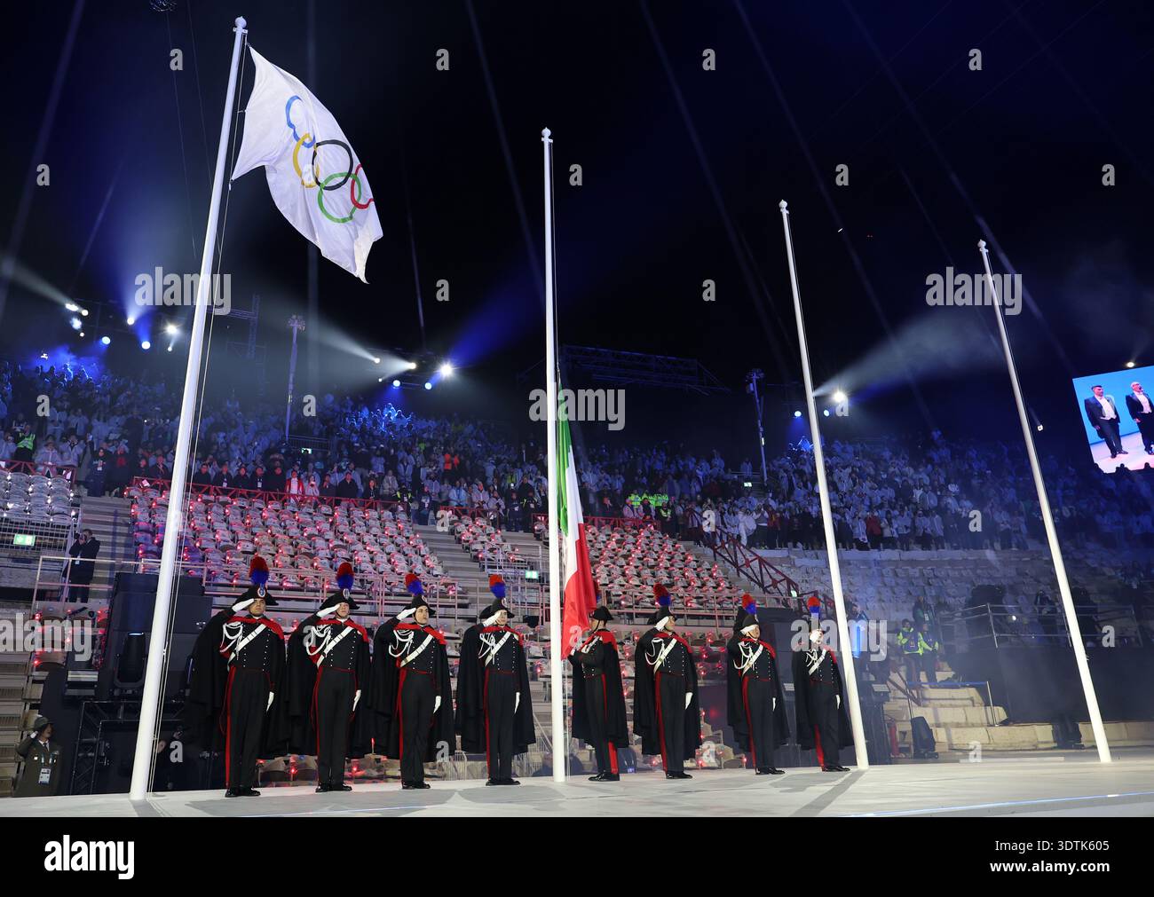 The Italian national flag is raised, during the closing ceremony of the ...