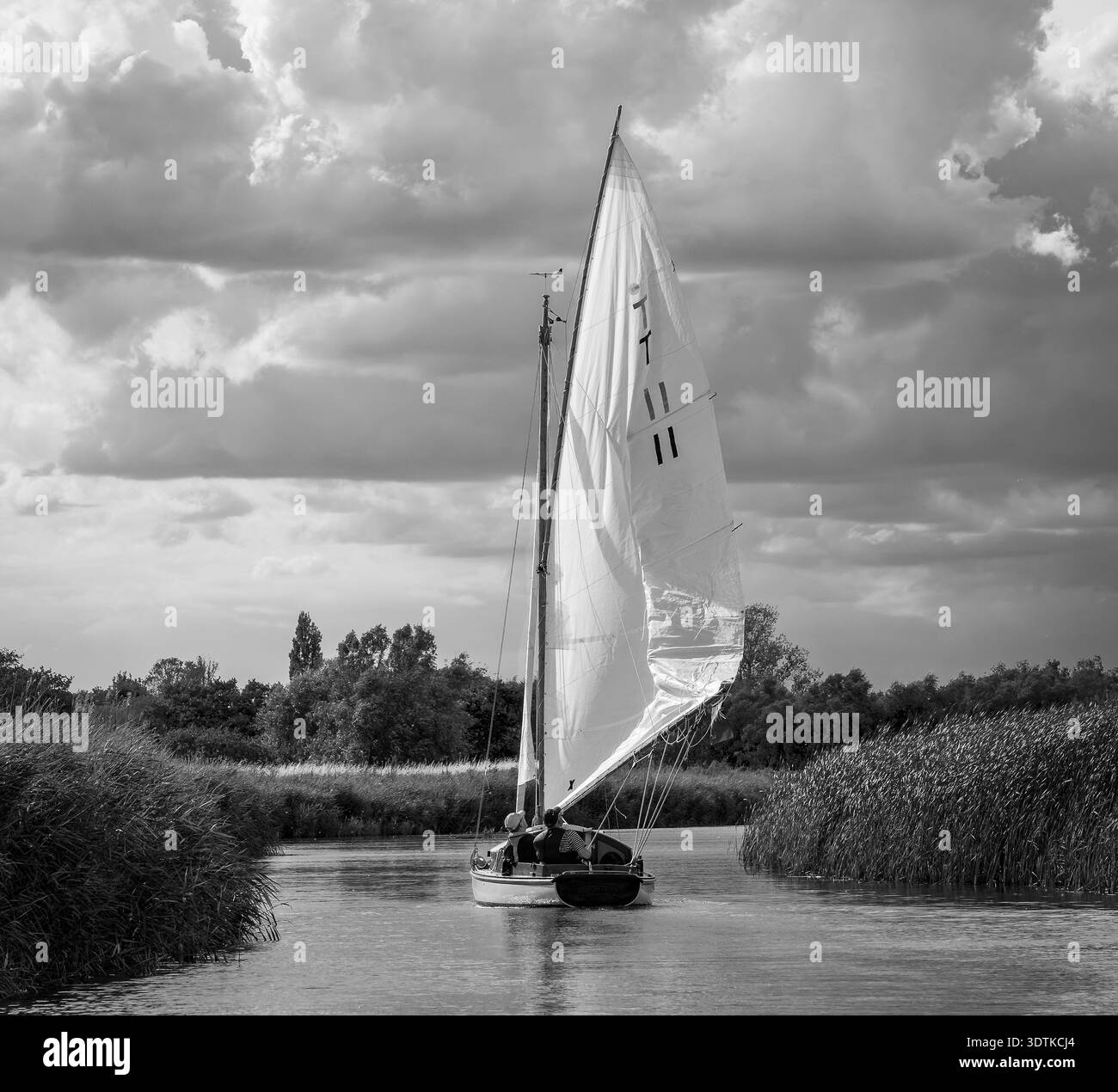 Two men and a sailing boat Black and White Stock Photos & Images - Alamy