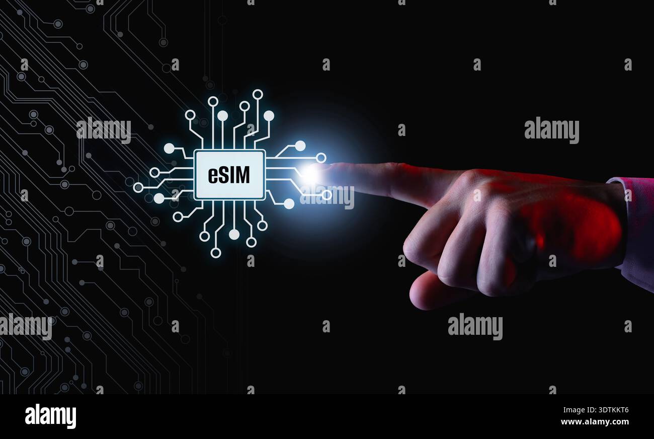 Businessman activating eSIM microchip on virtual screen, closeup. Black background with circuit board pattern Stock Photo