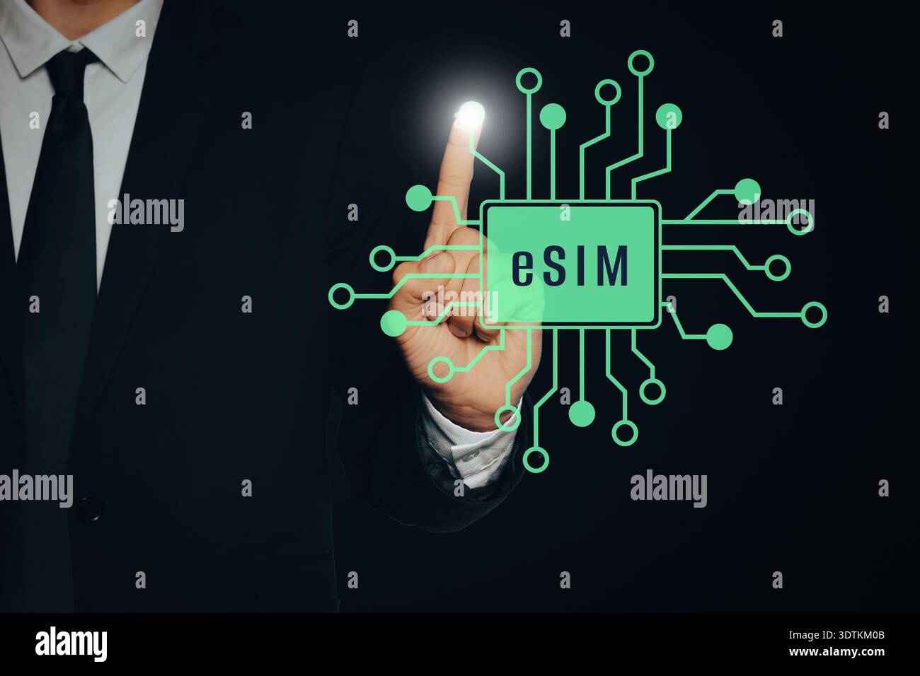 Businessman activating eSIM microchip on virtual screen, closeup. Black background Stock Photo