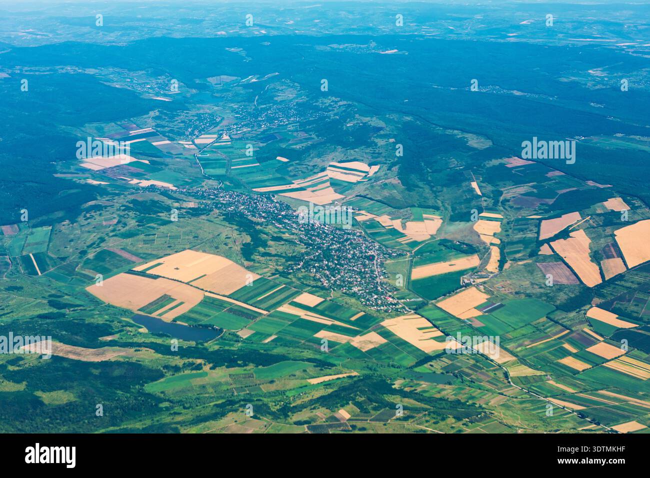Arncroach Vibrant aerial view of rural landscape shows patchwork fields, forests ...